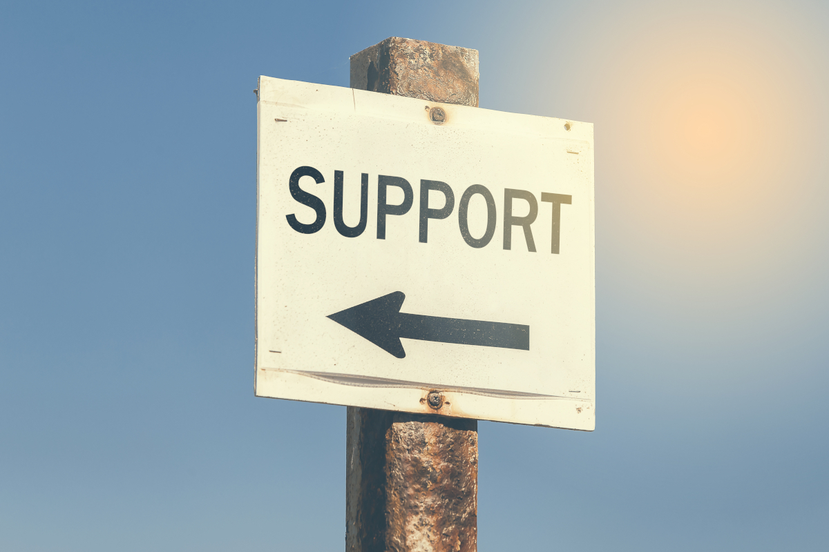 Support signpost pointing toward a hopeful future